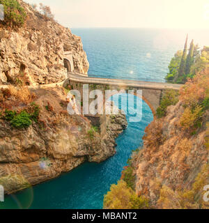 beautiful bridge over small Fiordo di Furore on Amalfi coast of Italy on sunny summer day Stock Photo