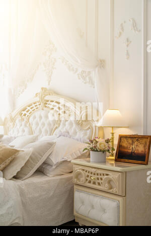 Elegant retro bedroom in the morning Stock Photo