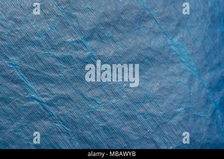 Background texture of blue plastic tarp Stock Photo
