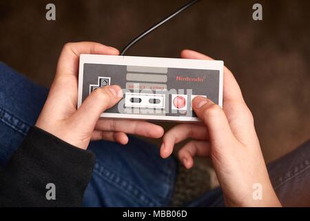 Nintengo NES,playing Super Mario 3 Stock Photo