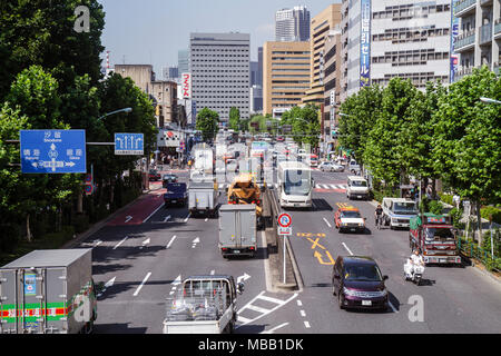 Tokyo Japan,Tsukiji,Shin ohashi Dori,street scene,traffic,taxi cabs,signs,buildings,city skyline,kanji,hiragana,characters,symbols,Japanese & English, Stock Photo