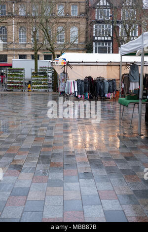 Salisbury, Wiltshire, UK. 10th April 2018. UK Weather. Grey damp start to the day with very few shoppers in the market despite the government and local council advertising Salisbury ii's open. for business. Salisbury Charter Market The Charter Market is a twice-weekly retail market held in Salisbury Market Place and run by the City Council. The market is held every Tuesday and Saturday, Credit: © Paul Chambers / Alamy Stock Photo/Alamy Live News Stock Photo