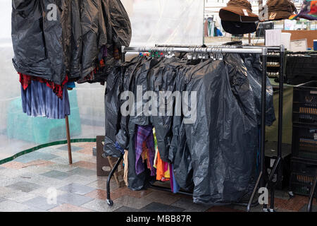 Salisbury, Wiltshire, UK. 10th April 2018. UK Weather. Grey damp start to the day with very few shoppers in the market despite the government and local council advertising Salisbury ii's open. for business. Salisbury Charter Market The Charter Market is a twice-weekly retail market held in Salisbury Market Place and run by the City Council. The market is held every Tuesday and Saturday, Credit: © Paul Chambers / Alamy Stock Photo/Alamy Live News Stock Photo