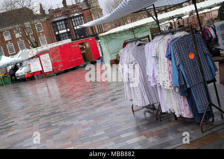 Salisbury, Wiltshire, UK. 10th April 2018. UK Weather. Grey damp start to the day with very few shoppers in the market despite the government and local council advertising Salisbury ii's open. for business. Salisbury Charter Market The Charter Market is a twice-weekly retail market held in Salisbury Market Place and run by the City Council. The market is held every Tuesday and Saturday, Credit: © Paul Chambers / Alamy Stock Photo/Alamy Live News Stock Photo