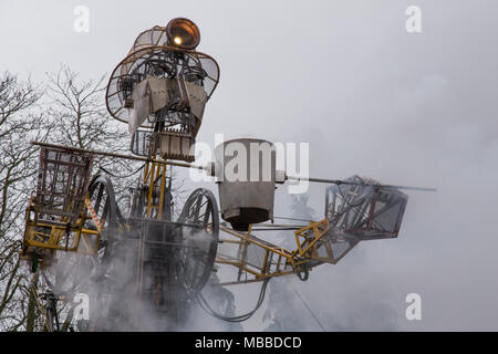 Cyfarthfa Park, Merthyr Tydfil, South Wales, UK.  10 April 2018.  The Man Engine visits the region today, to hundreds of people, on it's first ever Welsh tour.  People were treated to an amazing performance, history of Welsh mining, and a dazzling ending firework display.  Credit: Andrew Bartlett/Alamy Live News Stock Photo