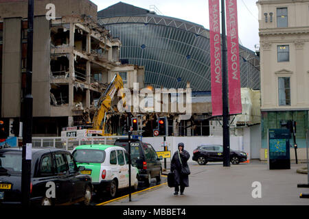 Glasgow, Scotland, UK 10th April. UK Weather :George square taxi stance queen street station refurbishment Victorian railway station train shed facade revealed  Miserable wet day with squalid showers for locals and tourists in the city centre. Gerard Ferry/Alamy news Stock Photo