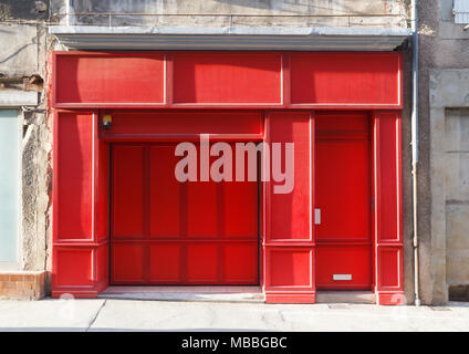 Red showcase with blank billboard in a closed store Stock Photo