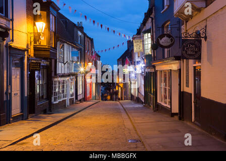 The Medieval buildings of Steep Hill, Lincoln, Lincolnshire, UK during the Blue Hour just after sunset. Stock Photo