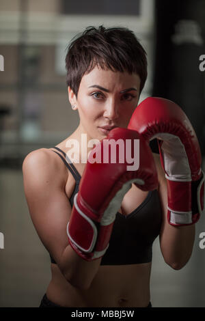 MMA woman fighter tough chick boxer punch pose pretty exercise training  cross fit athlete 16637672 Stock Photo at Vecteezy