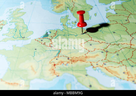 Red pin on a map pointing Berlin Stock Photo