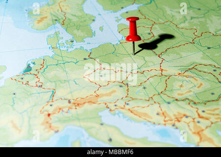 Red pin on a map pointing Warsaw Stock Photo