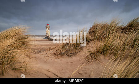 The Point of Ayr Lighthouse, also known as the Talacre Lighthouse, is a grade II listed building situated on the north coast of Wales Stock Photo
