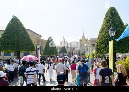BANGKOK, THAILAND - DECEMBER 29, 2012: People at the entrance of Emerald temple, famous attraction in Bangkok. Stock Photo