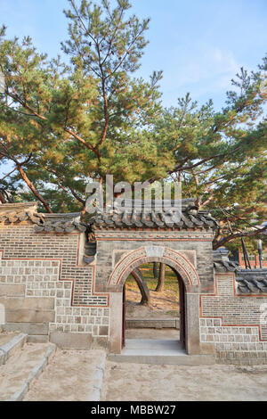 Seoul, Korea - December 9, 2015: Door and wall in Deoksugung. Deoksugung is a palace located in the center of Seoul city and served as the main palace Stock Photo