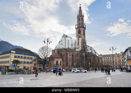 Bolzano, Italy - February 22, 2016: Bolzano Cathedral. It is Bolzano's chief landmark and a gem of Romanesque and Gothic architecture, a symbol of the Stock Photo