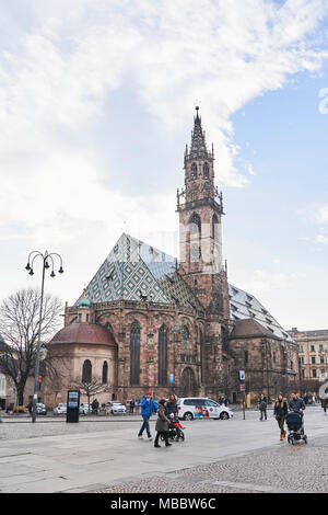 Bolzano, Italy - February 22, 2016: Bolzano Cathedral. It is Bolzano's chief landmark and a gem of Romanesque and Gothic architecture, a symbol of the Stock Photo