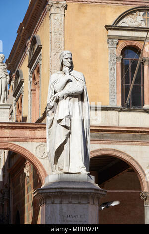 Verona, Italy - Febuary 20, 2016: Monument to Dante in Piazza dei Signori which is a city square located in the historic center of Verona. Dante was a Stock Photo