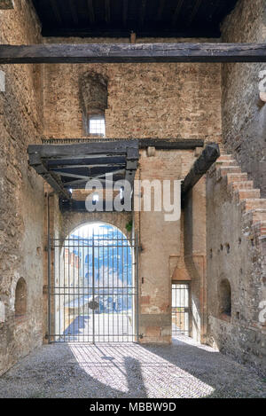 Sirmione, Italy - February 21, 2016: The Scaliger Castle is a medieval port fortification located at the entrance to the sirmio peninsula which divide Stock Photo