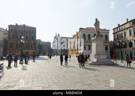 Venice, Italy - Febuary 19, 2016: Campo Santo Stefano, a city square in Venice. Venice is famous for its settings, archtecture and artwork. A part of  Stock Photo