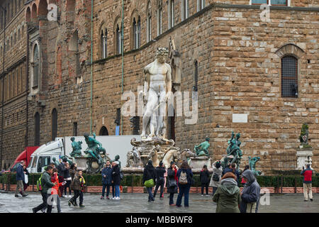 Florence, Italy - Febuary 17, 2016: Fountain of Neptune, a fountain situated on the Piazza della Signoria, in front of the Palazzo Vecchio in Firenze. Stock Photo