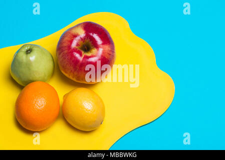Fruit lying on a cutting board Stock Photo