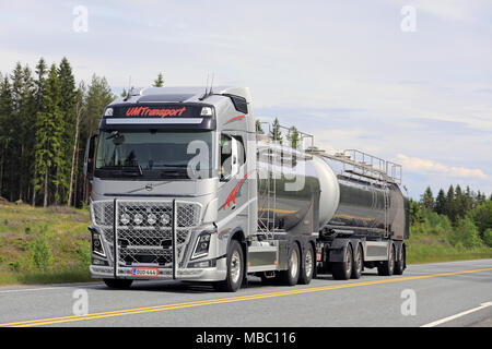 HUMPPILA, FINLAND - JUNE 16, 2017: Silver Volvo FH16 tank truck of UM Transport Ab hauls goods along highway in South of Finland at summer. Stock Photo