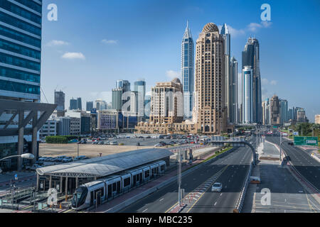 The Metro Tram and tall buildings in the Marina of Dubai, UAE, Middle East. Stock Photo