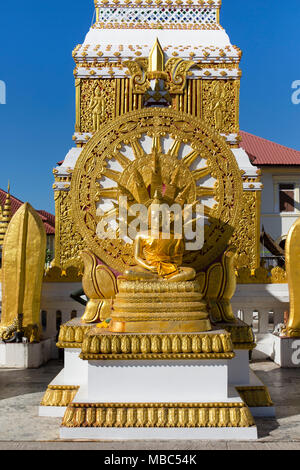 Wheel of Life and Golden Buddha Figure at the Chedi of Wat Mahathat Temple, Nakhon Phanom, Isan, Thailand Stock Photo