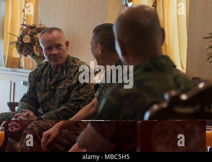 U.S. Marine Corps Lt. Gen. Lawrence Nicholson, left, commanding general, III Marine Expeditionary Force, talks with the Commandant of the Royal Thai Marine Corps, Vice Adm. Ratanah Vongsarojn, Feb. 14, 2018, at the Royal Thai Marine Command in Chonburi province, Thailand. Nicholson visited the Royal Thai Marine Command where he visited with the Royal Thai Marine Corps leadership and watched training demonstrations by Royal Thai Marine Corps recruits during exercise Cobra Gold 2018. The visit was conducted to increase teamwork, strengthen bonds and bolster interoperability to achieve effective  Stock Photo