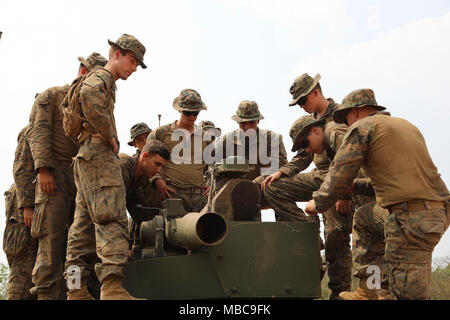 U.S. Marines from the Apache Company, 3rd Light Armored Reconnaissance Battalion, Combat Assault Battalion, 3rd Marine Division, receive some training on an Improved Target Acquisition System, Feb 17, 2018 during Exercise Cobra Gold 18 in Phu Lamyai, Kingdom of Thailand. The vehicle was part of U.S. Army’s Delta Company, 1-21 Infantry Battalion, 25th Infantry Division. The exercise, now in it’s 37th iteration, is designed to advance regional security and ensure effective responses to regional crisis by bringing together a robust multinational force to address shared goals and security commitme Stock Photo