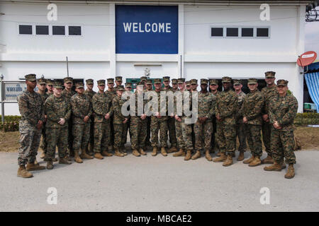 Commandant of the Marine Corps Gen. Robert B. Neller and Sergeant Major of the Marine Corps Sgt. Maj. Ronald L. Green pose for a photo with Squadron 103 on the Royal Thai Navy Airfield, U-Tapao, Thailand, Feb. 17, 2018. Neller and Green were there to hear briefs about the Noncombatant Evacuation Operation (NEO) and Rescue of Japanese Nationals Overseas (RJNO) exercise. (U.S. Marine Corps Stock Photo