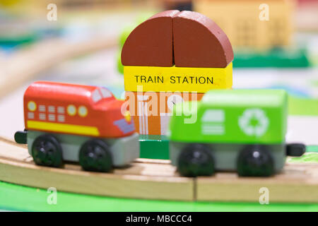 Two Train Wooden Toy with Train Station in backdrop (selective focused) Play set Educational toys for preschool indoor playground Stock Photo