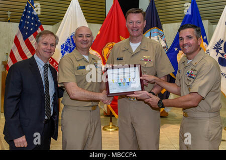 Fla. (Feb. 20, 2018) Rear Adm. Kyle Cozad (far right), commander, Naval ...