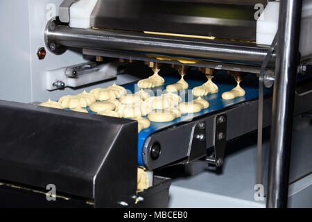 Biscuit depositing machine Stock Photo