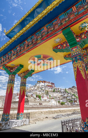 Freshly painted gate at Thiksay Monastery with ornate, bright colored decoration. The imposing monastery is dramatically located on a steep ridge