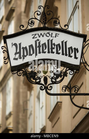 The sign outside the Zwölf Apostelkeller (Twelve Apostles Cellar) restaurant in a historic building in Vienna, Austria. Stock Photo