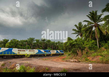 MAKENI, SIERRA LEONE - June 06, 2013: train with wagons transport the ore from the mines near Makeni, Sierra Leone Stock Photo