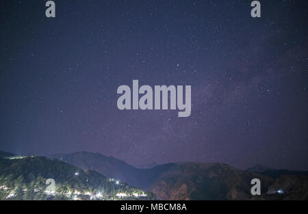 starry sky above Himalayas mountains in Dharamshala, India Stock Photo