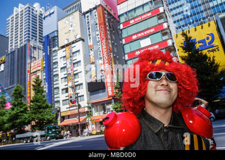 Tokyo Japan,Akihabara,Electric Town,Chuo Dori Street,kanji,Japanese English,Asian Oriental,man men male adult adults,cosplay,costume play,outfit,red w