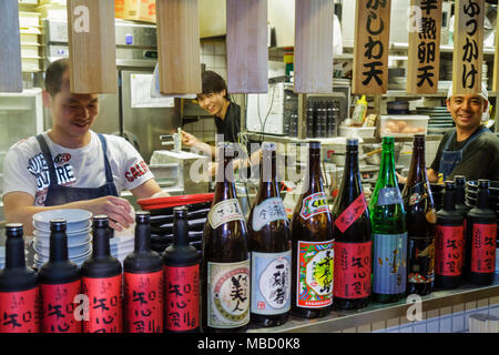 Tokyo Japan,Akihabara,Asian Oriental,man men male adult adults,workers,restaurant restaurants food dining cafe cafes,kitchen,cook,kanji,Japanese Engli Stock Photo