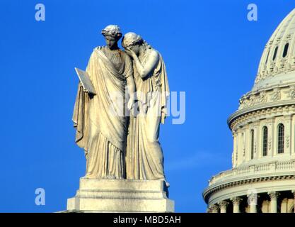 Symbols - America and History The Peace Monument (1877),sculpted by Franklin Simmons in marble. The two figures represent America weeping on the shoulders of History over the loss of her naval defenders during the Civil War. Washington DC Stock Photo