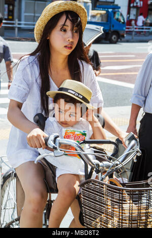 Tokyo Japan,Asia,Orient,Ueno,Chuo Dori,street scene,kanji,Japanese English,characters,symbols,Asian Asians ethnic immigrant immigrants minority,Orient Stock Photo
