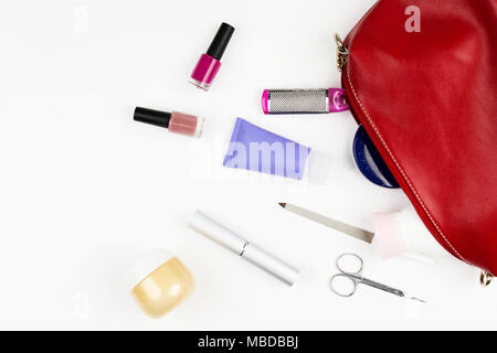 Manicure bag and tools, leg's nail careconcept on white background. Flat lay Stock Photo