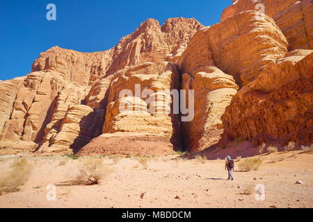 Trekking in Burrah Canyon, Wadi Rum Desert, Jordan Stock Photo