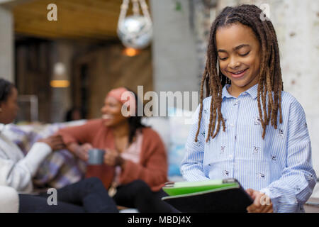 Girl using digital tablet Stock Photo