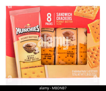 Winneconne, WI -  7 April 2018: A box of Munchies sandwich crackers in peanut butter flavor on an isolated background. Stock Photo