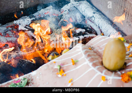 fire ceremony with offers of only vegetable origin during Guru Purnima Stock Photo