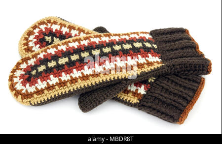 Two crocheted mittens on a white background Stock Photo