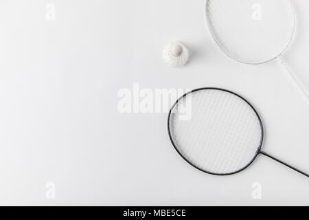 Sports flat lay with shuttlecock and badminton racket, skipping rope,  sneakers and measuring tape on purple background. Fitness, sport and  healthy lif Stock Photo - Alamy