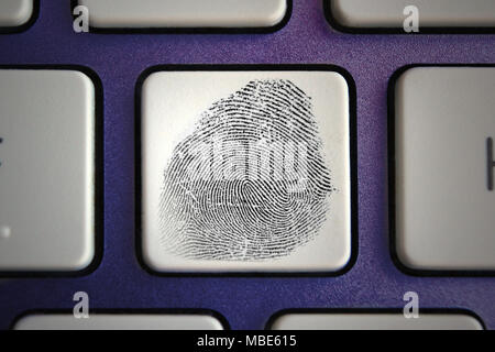 Image of fingerprint icon on computer keyboard button Stock Photo
